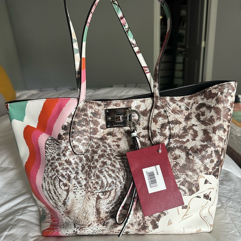 Salvatore Ferragamo handbag with suede interior and detachable wristlet
